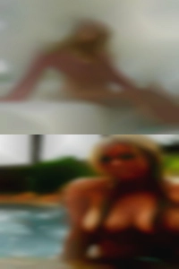 Speaking topless nude woman.